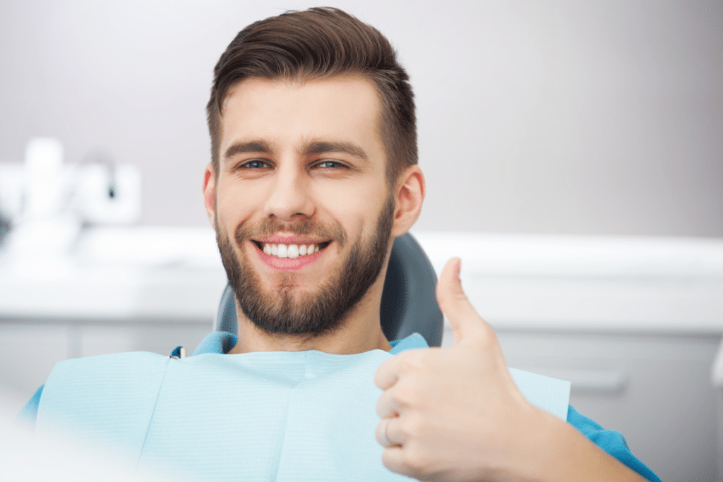 Cosmetic Dentistry in Denver, CO smiling dental patient Dr. Rossow DDS, Laura Noce DMD, Joseph Burns DDS, Cheri Neal DDS. Aspen Dental General, Cosmetic, Restorative, Preventative, Family Dentistry dentist in Denver CO 80206